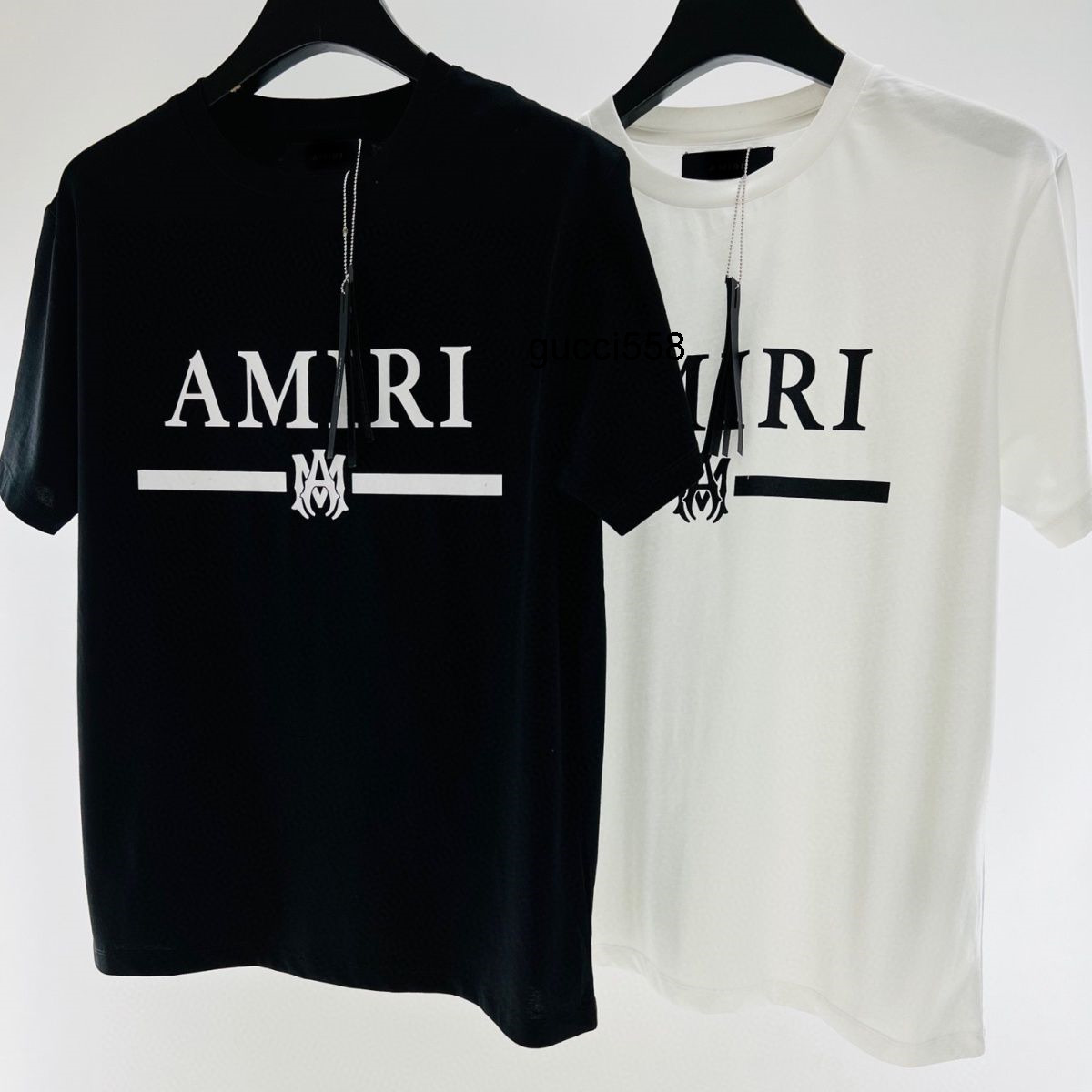 22ss European and American Amirss stripe pattern letter printing simple graffiti casual round neck black and white short sleeve T-shirt
22ss European and American Amirss stripe pattern letter printing simple graffiti casual round neck black and white short sleeve T-shirt