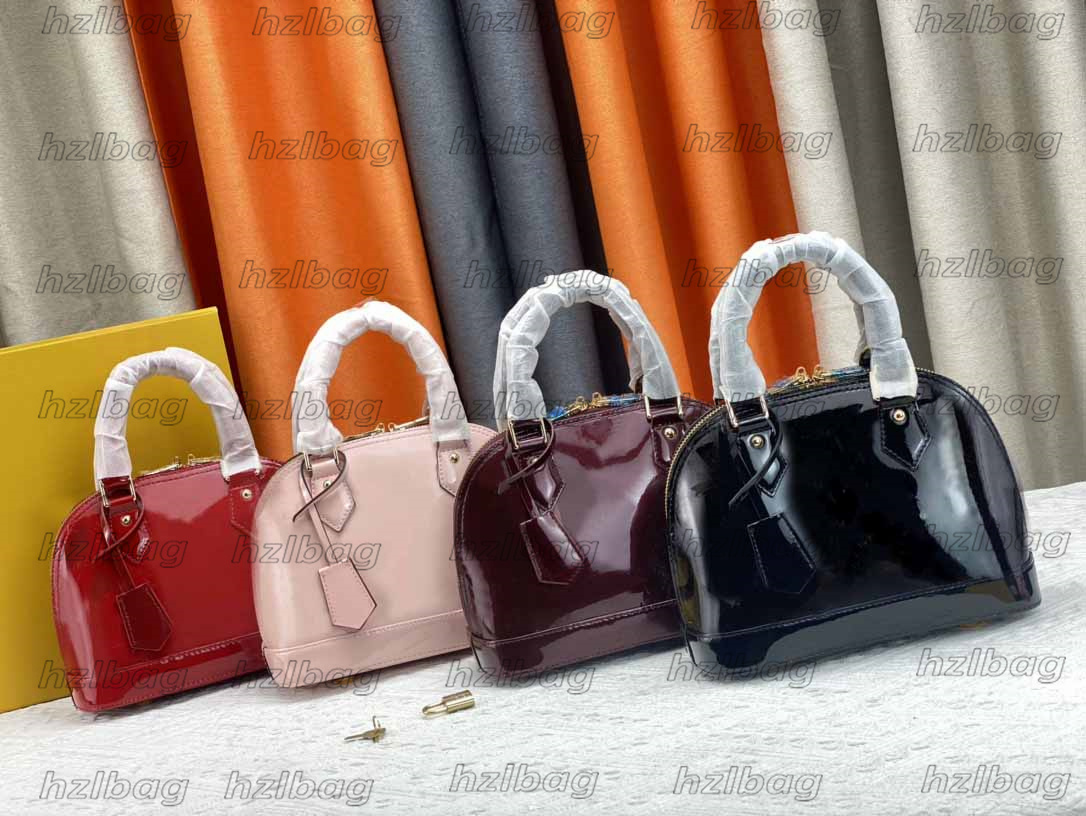 ALMA BB Shell Shoulder Bag Women Patent Leather Monograms Vernis embossed engraved padlock Designers handbag hand-stitched Toron handles chic key bell Cross Body