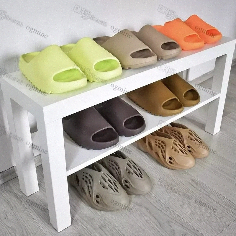 Designer slippers for men and women triple black white resin pattern foam running slide outdoor leisure slide yeezys slippers yeezies slide, Customize
Designer slippers for men and women triple black white resin pattern foam running slide outdoor leisure slide yeezys slippers yeezies slide, Customize