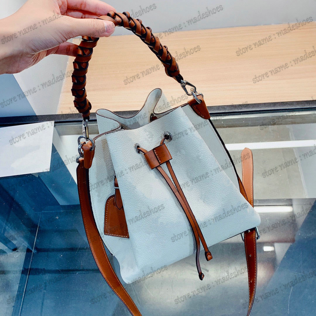 Mahina Muria in Creme Bucket Shoulder Bag Perforated Handle Drawstring Bag Womens Luxurys Designer Handbag Cross Body With Keybell Name Tag Hobo Tote
Mahina Muria in Creme Bucket Shoulder Bag Perforated Handle Drawstring Bag Womens Luxurys Designer Handbag Cross Body With Keybell Name Tag Hobo Tote