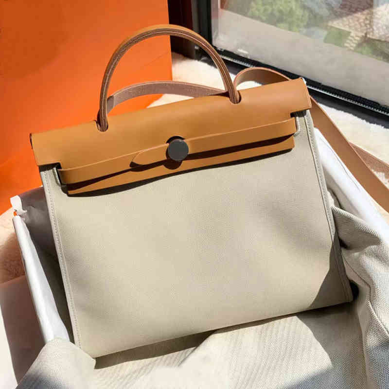 Herme Handbag Herbag imported first layer cowhide canvas splicing 31 portable women's single shoulder diagonal span high-capacity commuter, Solid black - 31cm
Herme Handbag Herbag imported first layer cowhide canvas splicing 31 portable women's single shoulder diagonal span high-capacity commuter, Solid black - 31cm