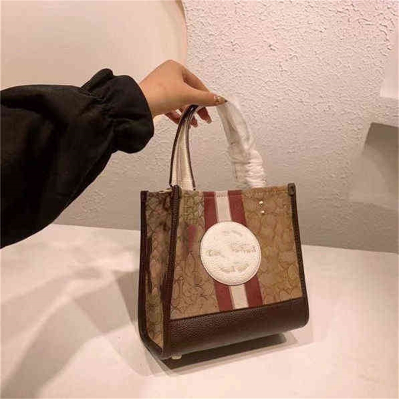 Designer Bags coac New Fashion Tot Mommy Shopping Bag Size Single Shoulder Messenger Handbag Yzl, Small blue
Designer Bags coac New Fashion Tot Mommy Shopping Bag Size Single Shoulder Messenger Handbag Yzl, Small blue