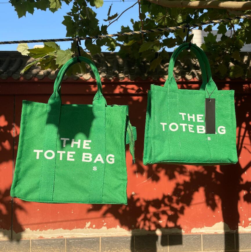 New Fashion Summer Solid Color Jacquard Commuter classic Canvas Tote Bag Women's Handbag with letters printing two sizes, Red
New Fashion Summer Solid Color Jacquard Commuter classic Canvas Tote Bag Women's Handbag with letters printing two sizes, Red