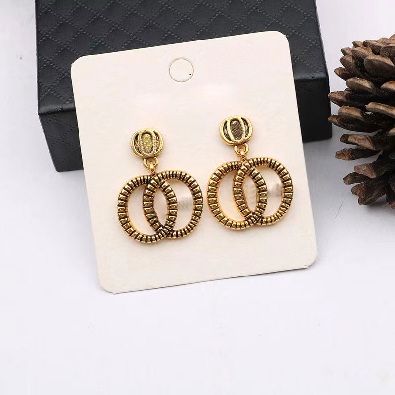 Fashion Charm Woman Earrings Hoop Huggie Charms Designer Man Womens Unisex Earring Two Pieces Jewelry Buckle
Fashion Charm Woman Earrings Hoop Huggie Charms Designer Man Womens Unisex Earring Two Pieces Jewelry Buckle