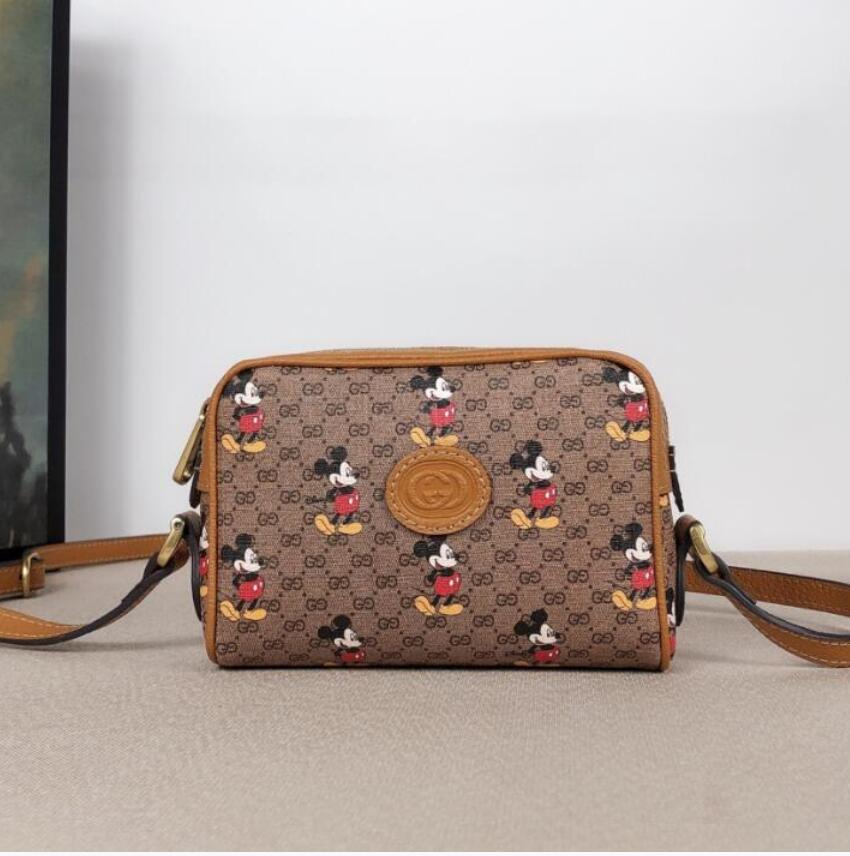 Gucci Shoulder Bags new model 602536, Mickey image GG Canvas Shoulder backpack leather color printing ` embroidery sticker size: 17.5X12X5cm
Gucci Shoulder Bags new model 602536, Mickey image GG Canvas Shoulder backpack leather color printing ` embroidery sticker size: 17.5X12X5cm