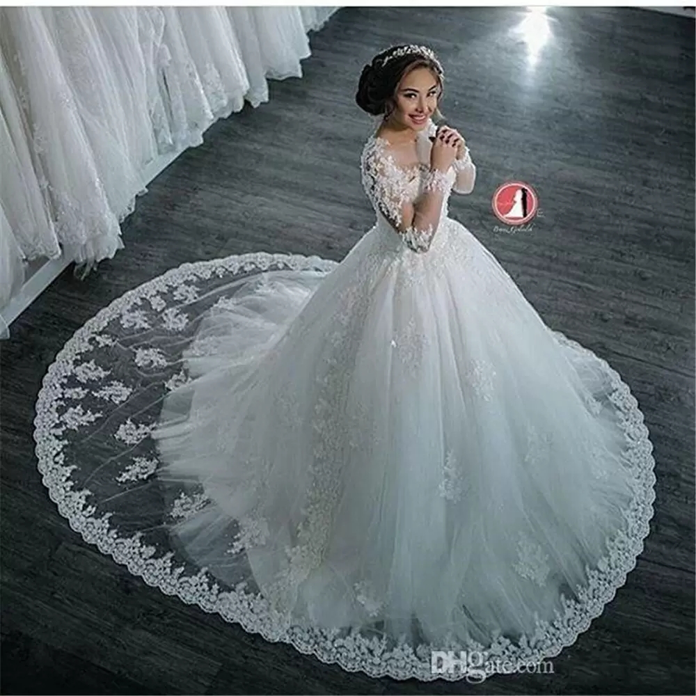 2022 New Dubai Elegant Long Sleeves A-line Wedding Dresses Sheer Crew Neck Lace Appliques Beaded Vestios De Novia Bridal Gowns with Buttons B0408