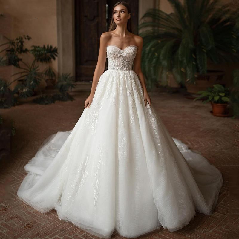 Elegant A-e Dresses Sleeveless Strapless Seetheart Hollow Lace Appliques Sequins Sweep or Length Backless Boho Wedding Gowns Plus Size