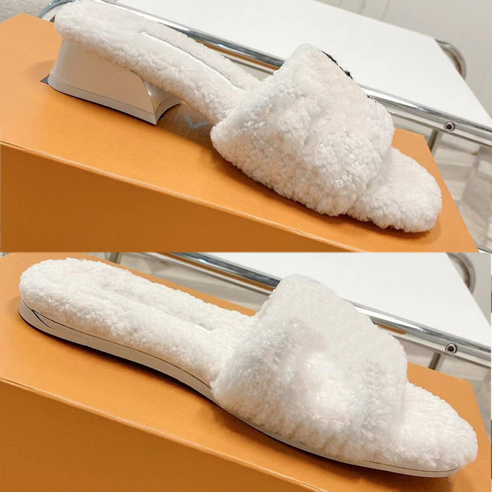 The MAGNETIC MULES Slipper Sandals for Women feature a fluffy graphic block heel that matches color of vamp and soft shearling footbed for ultimate comfort slippers, Shipping supplement 
The MAGNETIC MULES Slipper Sandals for Women feature a fluffy graphic block heel that matches color of vamp and soft shearling footbed for ultimate comfort slippers, Shipping supplement