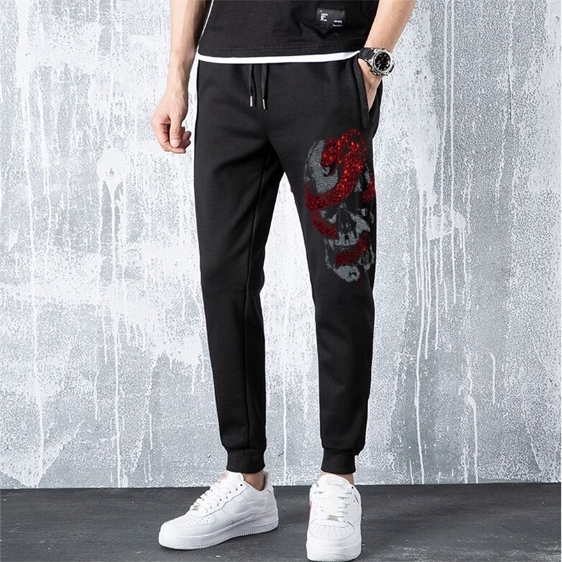 Men's Skull Sweatpants Fitness Joggers Spring Male Side drill High Street Hip Long Trousers Rhinestones Pants 201128