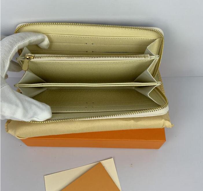 Luxurys Designers clutch wallet leather wallet single zipper zippy wallets lady ladies long classical purse with box, Shipping
Luxurys Designers clutch wallet leather wallet single zipper zippy wallets lady ladies long classical purse with box, Shipping