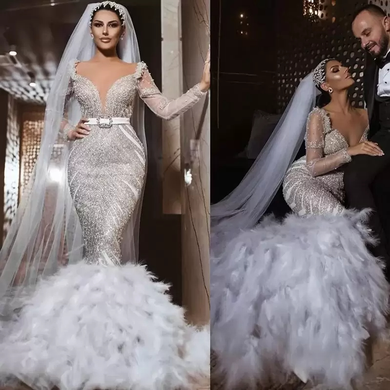 2022 Luxury Sparkly Mermaid Wedding Dresses V Neck Sequins Beaded Feather Long Sleeves Bridal Gown Tiered Ruffles Sweep Train Vestidos De Novia, White
2022 Luxury Sparkly Mermaid Wedding Dresses V Neck Sequins Beaded Feather Long Sleeves Bridal Gown Tiered Ruffles Sweep Train Vestidos De Novia, White