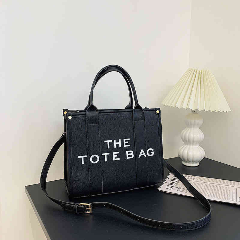 Designer Letter Leather Women Large Handbags Brand Printing Shoulder Bag Fashion Tote Ladies 2022 New Business Top-Handle Bags G220420, Black
Designer Letter Leather Women Large Handbags Brand Printing Shoulder Bag Fashion Tote Ladies 2022 New Business Top-Handle Bags G220420, Black