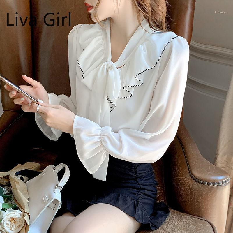 Women' Blouses & Shirts Black Blouse Women Spring Tops 2022 Korean Fashion Ruffle Bow Tie Collar White Shirt Office Long Sleeve Blusas Muje 
Women' Blouses & Shirts Black Blouse Women Spring Tops 2022 Korean Fashion Ruffle Bow Tie Collar White Shirt Office Long Sleeve Blusas Muje