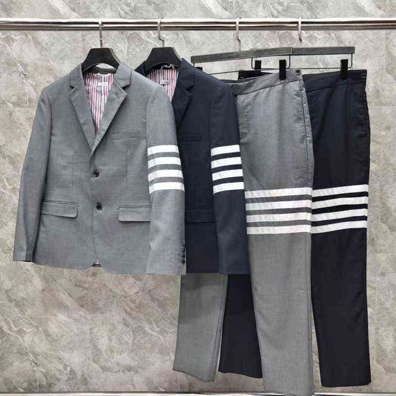 Trendy TB suit men's and women's lovers' white four bar suit trousers wool blended British style business suit, Blue trousers
Trendy TB suit men's and women's lovers' white four bar suit trousers wool blended British style business suit, Blue trousers