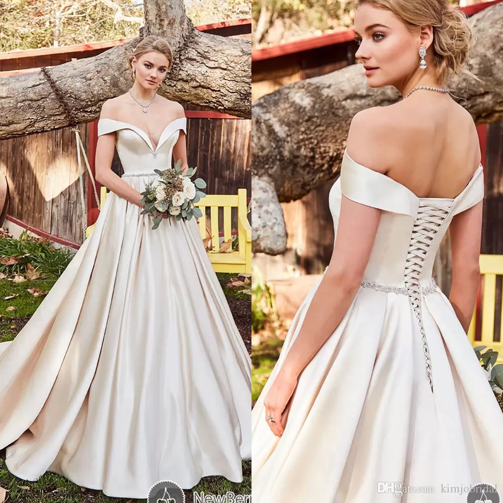 Elegant Ball Gown Wedding Dresses Off the Shoulder Satin Lace Up Back Satin Floor Length Ivory Bridal Dresses
Elegant Ball Gown Wedding Dresses Off the Shoulder Satin Lace Up Back Satin Floor Length Ivory Bridal Dresses