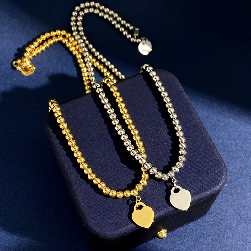 Fashion Designer Pendant Necklace Classic Heart Bead Chain Men 925 Silver Necklaces Gold Necklace High Quality Jewelry Love Bracelet Earring
Fashion Designer Pendant Necklace Classic Heart Bead Chain Men 925 Silver Necklaces Gold Necklace High Quality Jewelry Love Bracelet Earring