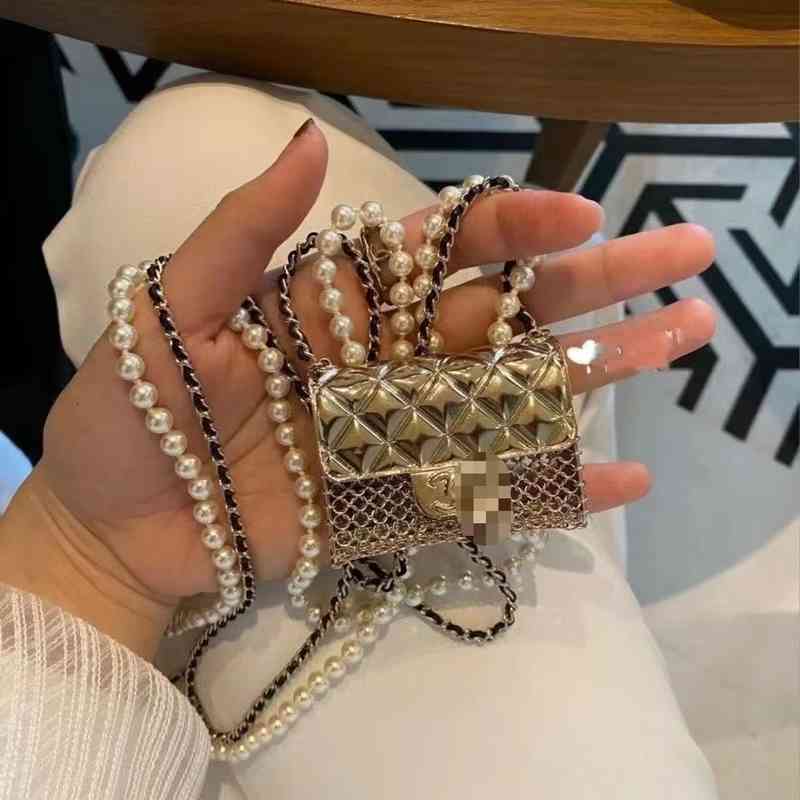 designer Belts belt Star net red with small fragrance mini metal chain pearl diagonal shoulder bag earphone lipstick decorative waist female
designer Belts belt Star net red with small fragrance mini metal chain pearl diagonal shoulder bag earphone lipstick decorative waist female