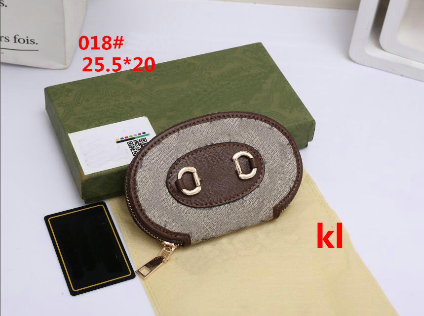Luxurys Designers Wallets Purse Bag Fashion Short Wallet Embossed Monograms Empreinte Classic Card Holder Zippy Coin Purse 018#30 25.5X5X20CM, A4
Luxurys Designers Wallets Purse Bag Fashion Short Wallet Embossed Monograms Empreinte Classic Card Holder Zippy Coin Purse 018#30 25.5X5X20CM, A4
