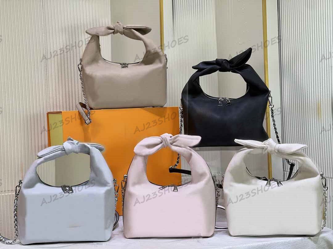 WHY KNOT PM Perforated Mahina Shoulder Bag M20700 Creme Beige Womens Knot-shape Designer Handle Bag Braided Chain Luxury Cross Body M20701 Galet, 02
WHY KNOT PM Perforated Mahina Shoulder Bag M20700 Creme Beige Womens Knot-shape Designer Handle Bag Braided Chain Luxury Cross Body M20701 Galet, 02