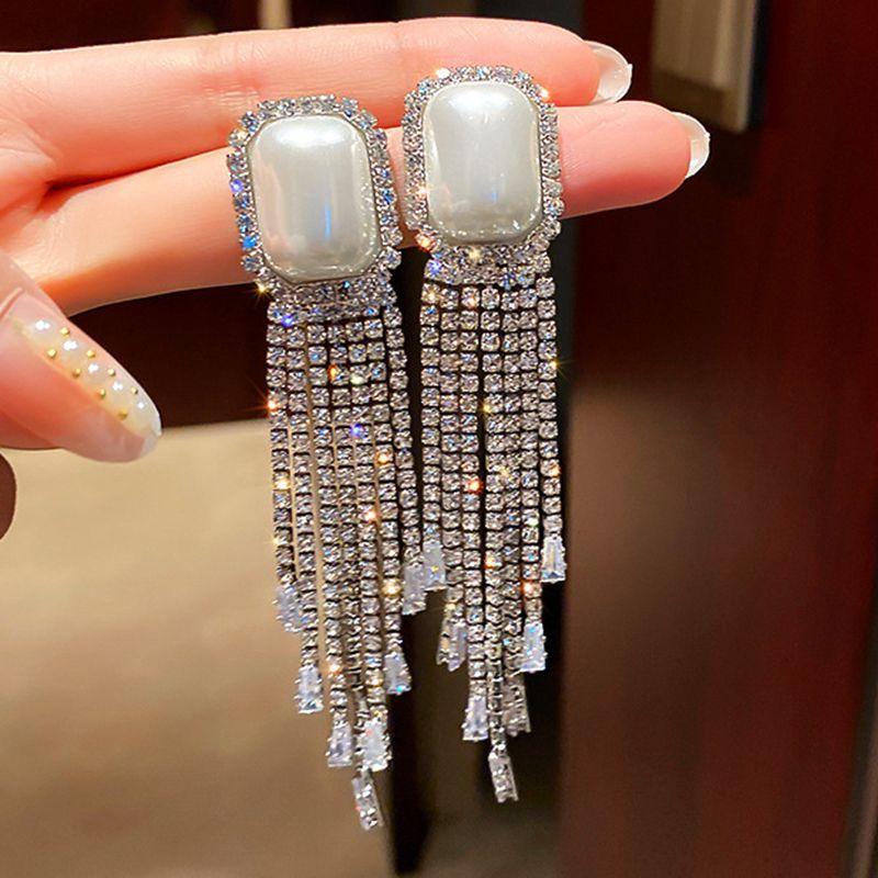 Dangle & Chandelier Silver Anti Fading Shiny Zircon Pearl Tassel Earrings For Woman Show Party Dating Long Fashion Jewelry AccessoriesDangle
Dangle & Chandelier Silver Anti Fading Shiny Zircon Pearl Tassel Earrings For Woman Show Party Dating Long Fashion Jewelry AccessoriesDangle