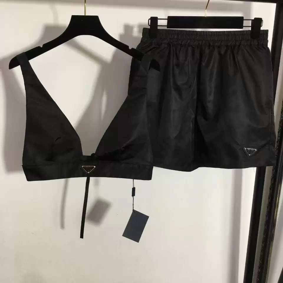 Womens Two Piece Pants Set With Triangle Prades Textile Metal V Neck Vest Mini Short Set Streetwear Fashion Crop Top 22ss New Tracksuit, Black/blue
Womens Two Piece Pants Set With Triangle Prades Textile Metal V Neck Vest Mini Short Set Streetwear Fashion Crop Top 22ss New Tracksuit, Black/blue