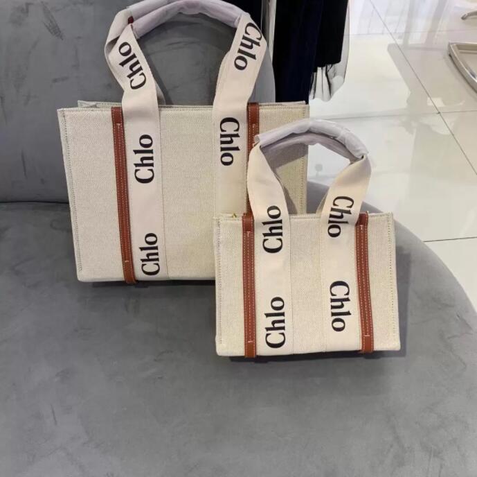 Top quality Women handbags WOODY Tote shopping bag handbag high NYLON hobo fashion linen Large Beach bags luxury designer travel Crossbody Shoulder bag Purses
Top quality Women handbags WOODY Tote shopping bag handbag high NYLON hobo fashion linen Large Beach bags luxury designer travel Crossbody Shoulder bag Purses