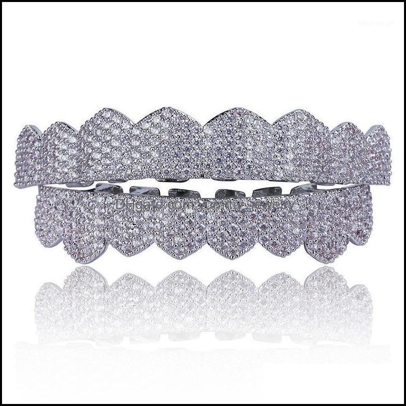 Other Body Jewelry Hip Hop Cubic Zirconia Paved Bling Iced Out Flat Teeth Grillzs Top Bottom Set Dental Grills Men Rapper Cosplay Gift1 Drop
Other Body Jewelry Hip Hop Cubic Zirconia Paved Bling Iced Out Flat Teeth Grillzs Top Bottom Set Dental Grills Men Rapper Cosplay Gift1 Drop