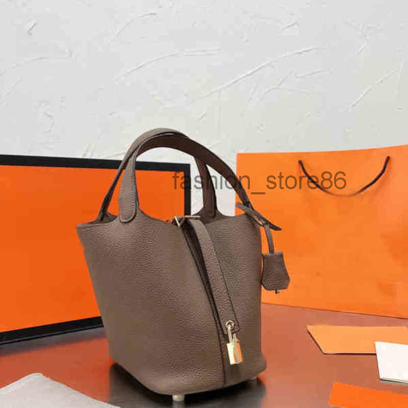 Bucket Bag Closed-toe Layer Cowhide Food Basket Tote All-match Shoulder Handbag Genuine Leather Womens Mother and Child Purses 220402
Bucket Bag Closed-toe Layer Cowhide Food Basket Tote All-match Shoulder Handbag Genuine Leather Womens Mother and Child Purses 220402