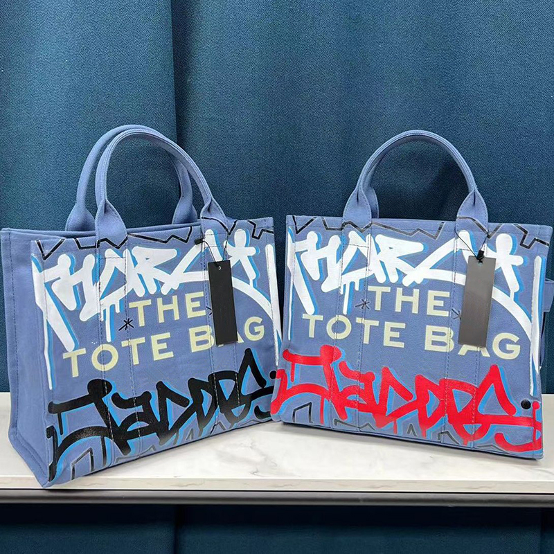 Canvas women's bag 2022 new graffiti large-capacity one-shoulder messenger tote handbag, Red
Canvas women's bag 2022 new graffiti large-capacity one-shoulder messenger tote handbag, Red