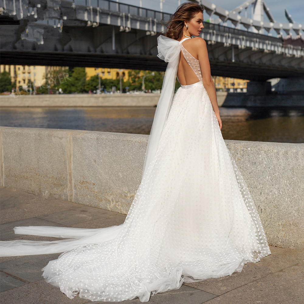Romantic V Neck Wedding Dress Sleeveless Tulle Bridal Gowns Princess Bowknot Sweep Train Backless Custom Made Robe De Mariée
