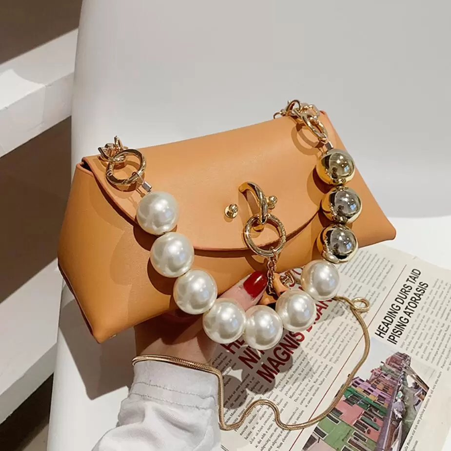 Sweet Lady Pearl Mini Tote bag 2021 Spring New Hhigh-quality PU Leather Womens Designer Handbag Chain Shoulder Messenger Bag, Orange 21 x 10 x 9 cm
Sweet Lady Pearl Mini Tote bag 2021 Spring New Hhigh-quality PU Leather Womens Designer Handbag Chain Shoulder Messenger Bag, Orange 21 x 10 x 9 cm