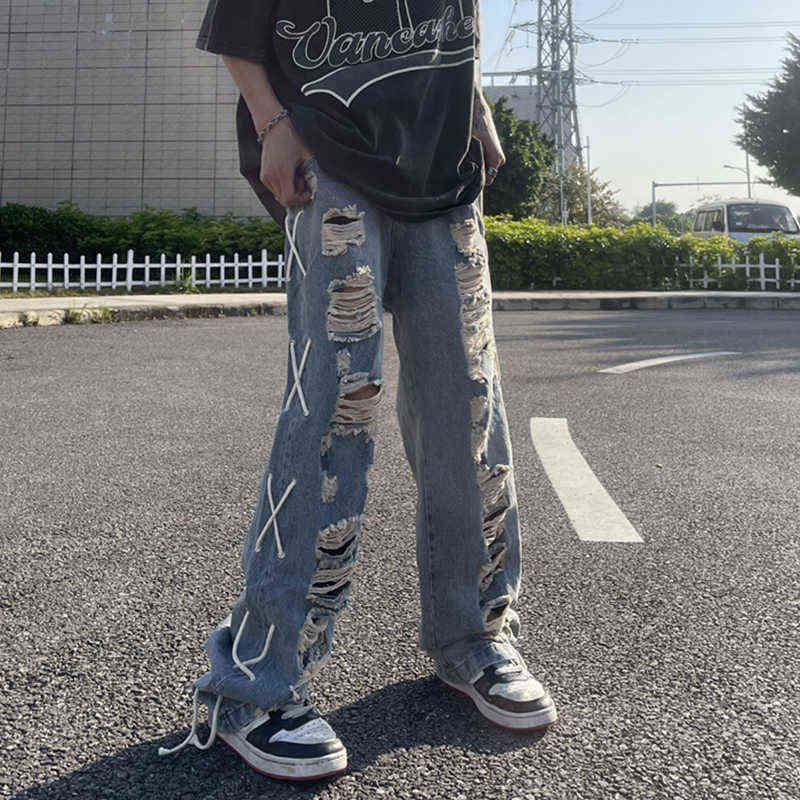 Side Ripped Hole Lace Up Washed Retro Jeans Mens and Womens High Street Casual Denim Trousers Loose Oversized Jean Pants T220803, Blue 
Side Ripped Hole Lace Up Washed Retro Jeans Mens and Womens High Street Casual Denim Trousers Loose Oversized Jean Pants T220803, Blue