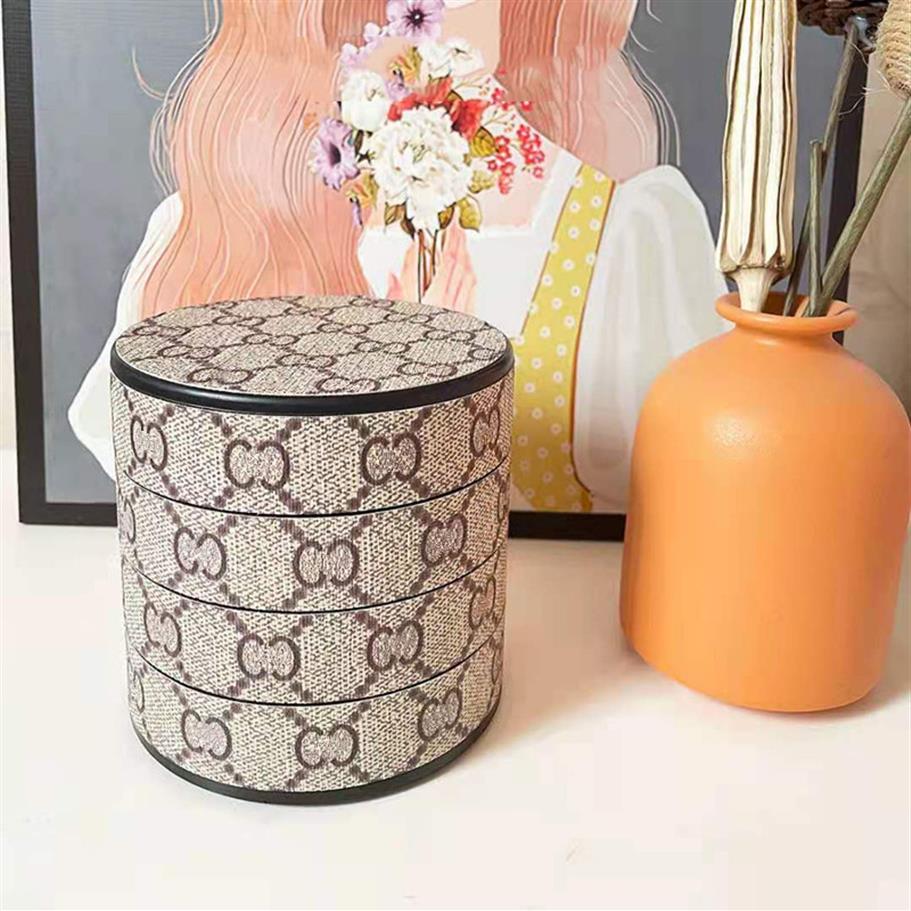 Luxurys Designer Jewelry Storage Box Women Bag Small and Exquisite Boxes 360 degree four-layer Storage Case Spin with mirror Glett2459, Brown
Luxurys Designer Jewelry Storage Box Women Bag Small and Exquisite Boxes 360 degree four-layer Storage Case Spin with mirror Glett2459, Brown
