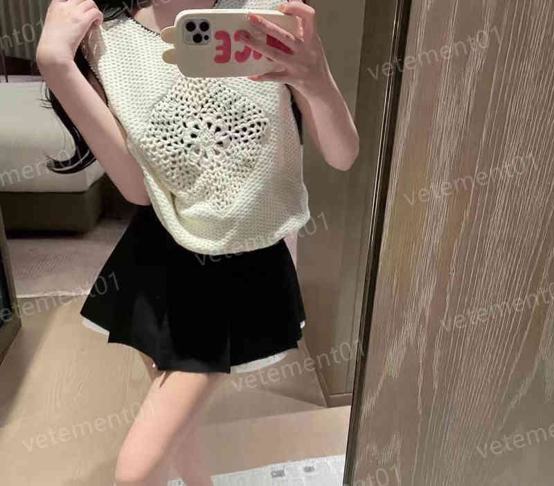 Womens Designer Tanks Camis Hand Crocheted Hollow Knit Tank Top Top Fashion Brand High Quality Luxury Women Clothing 0912
Womens Designer Tanks Camis Hand Crocheted Hollow Knit Tank Top Top Fashion Brand High Quality Luxury Women Clothing 0912