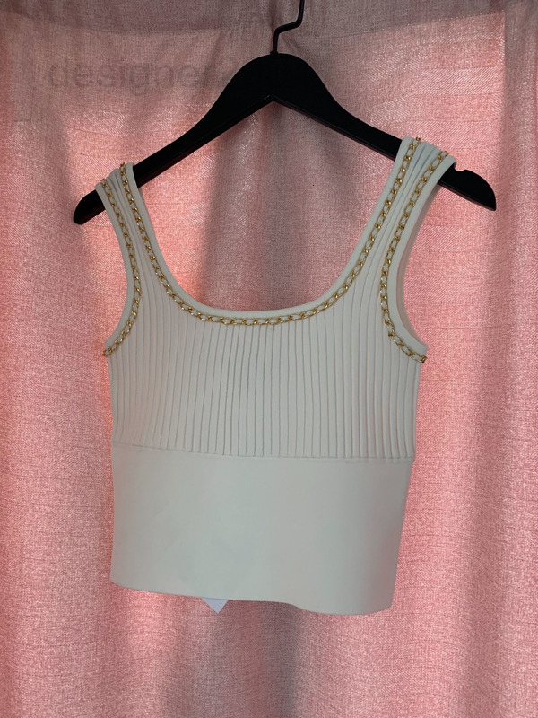 T-shirt pour femmes Designer 20SS Balman tricoté Slim Fit U Gest court court ouverte Navel Ice Silk Bottom Pull Pull Chaîne LS94