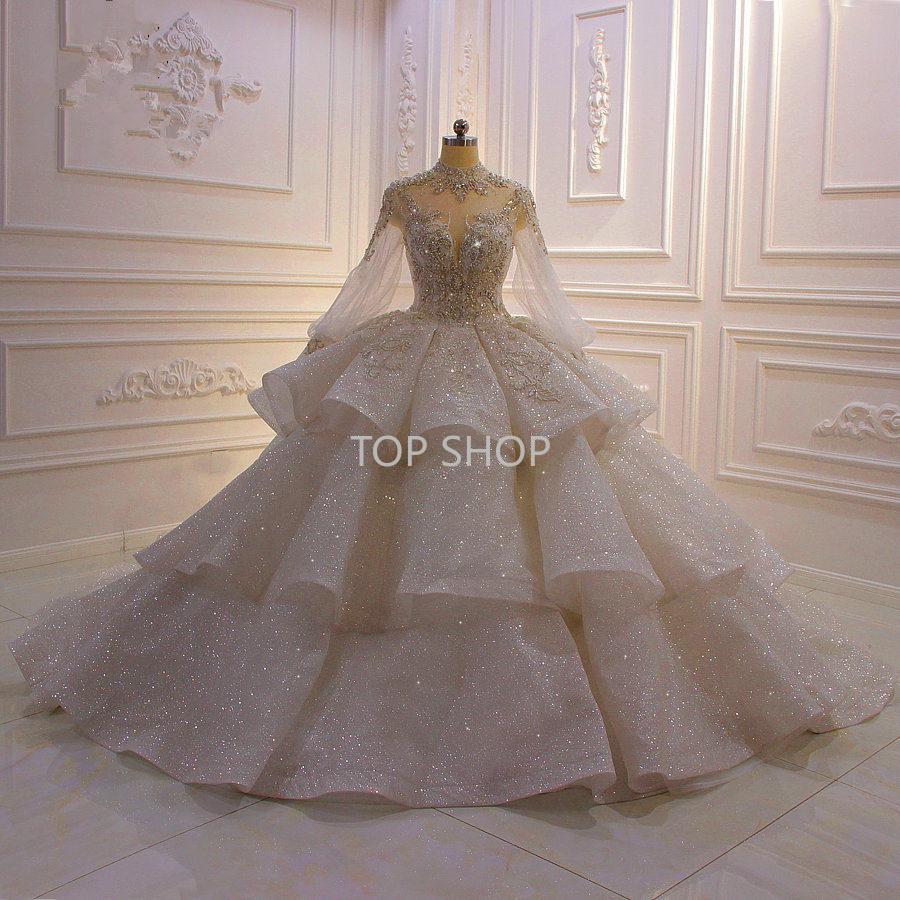 High Neck Ball Gown Wedding Dresses With Poet Long Sleeves Luxury Crystal Beaded Saudi Arabian Dubai Bridal Gown Plus Size 2022, Gold
High Neck Ball Gown Wedding Dresses With Poet Long Sleeves Luxury Crystal Beaded Saudi Arabian Dubai Bridal Gown Plus Size 2022, Gold