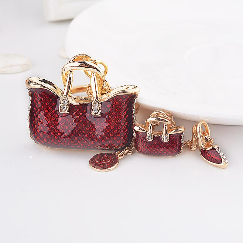 Keychains Fashion High Heels Double Handbag Keychain Rhinestone Car Keyring Women Bag Charm Wallet Pendant Creative Key Chains PresentKeycha
Keychains Fashion High Heels Double Handbag Keychain Rhinestone Car Keyring Women Bag Charm Wallet Pendant Creative Key Chains PresentKeycha