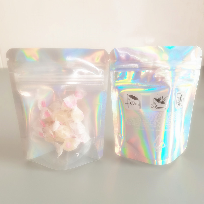 Resealable Plastic Retail Clear Childproof Packaging Bags Holographic transparent Pouch Smell Proof mylar Bag for Dry flowers packing bagg
Resealable Plastic Retail Clear Childproof Packaging Bags Holographic transparent Pouch Smell Proof mylar Bag for Dry flowers packing bagg