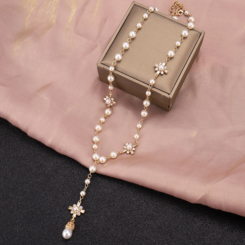 New necklace women039s long Korean Fashion Pendant with European and American famous pearl sweater Necklace