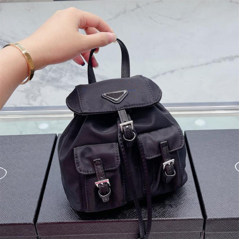 Wholesale mini classic canvas backpack parachute fabric waterproof nylon rucksack schoolbag travel new women bags fashion Designer bag, Pink
Wholesale mini classic canvas backpack parachute fabric waterproof nylon rucksack schoolbag travel new women bags fashion Designer bag, Pink