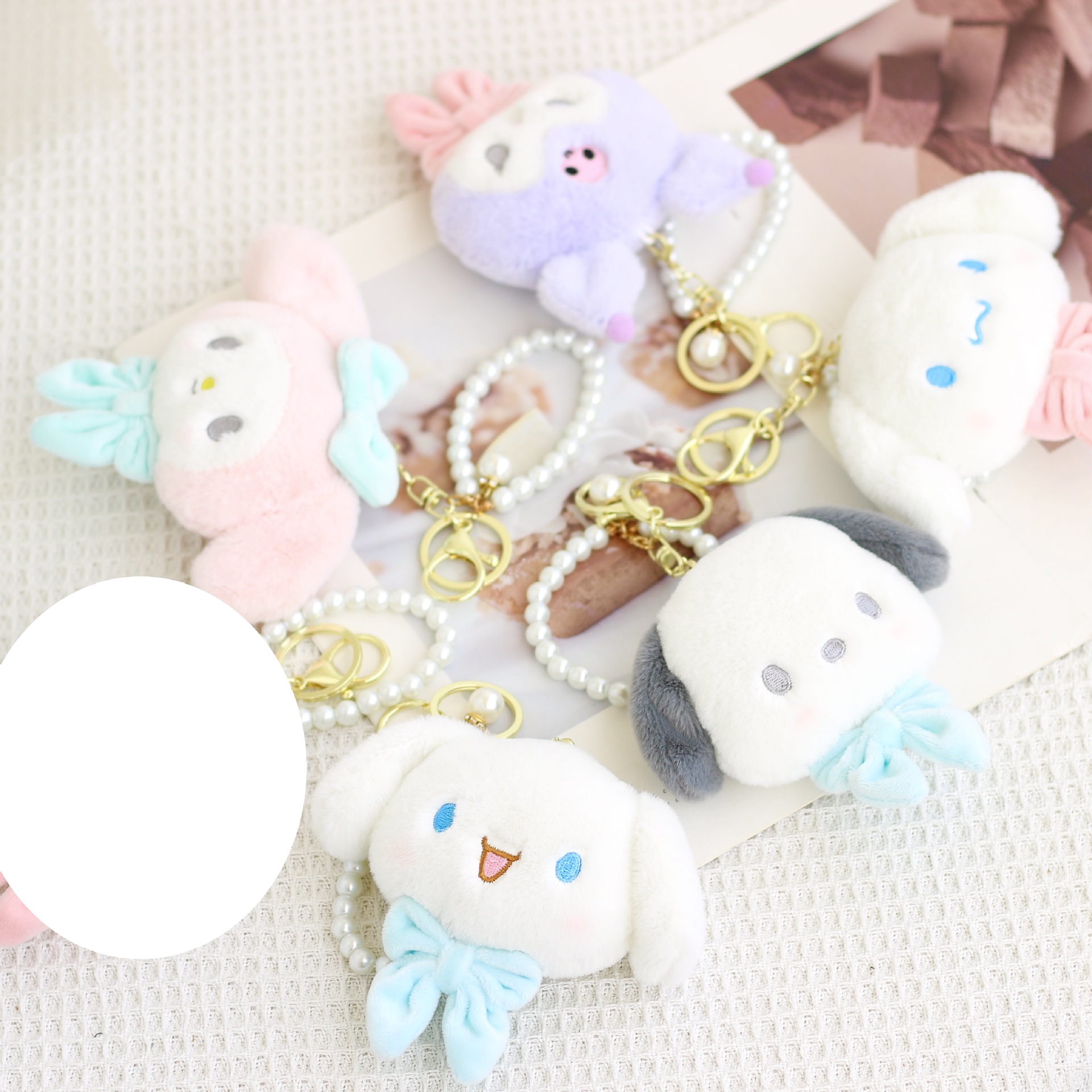 Cute Japanese pearl bow jade pudding dog little devil Kuromi big eared dog key chain pendant doll, 12cm
Cute Japanese pearl bow jade pudding dog little devil Kuromi big eared dog key chain pendant doll, 12cm
