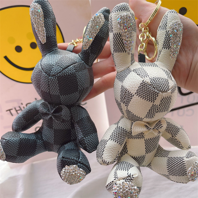 Designer Cartoon Leather Crystal Rabbit Doll Keychain Key Chain Ring Bag Pendant
Designer Cartoon Leather Crystal Rabbit Doll Keychain Key Chain Ring Bag Pendant