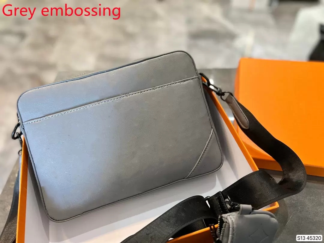 High quality men's designer three piece messenger bag multi shoulder horizontal bag leather clutch handbag designer handbags
High quality men's designer three piece messenger bag multi shoulder horizontal bag leather clutch handbag designer handbags