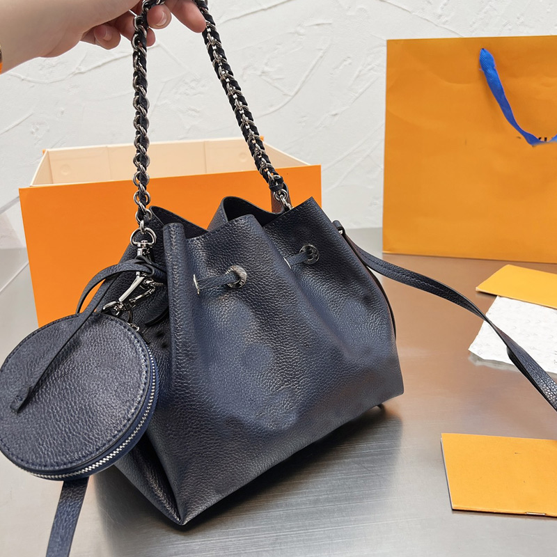 Bucket Bag Women Drawstring Handbag Calf Leather Perforated Letter Flower Shoulder Bags with Round Coin Purse Adjust Removable Strap 07
Bucket Bag Women Drawstring Handbag Calf Leather Perforated Letter Flower Shoulder Bags with Round Coin Purse Adjust Removable Strap 07