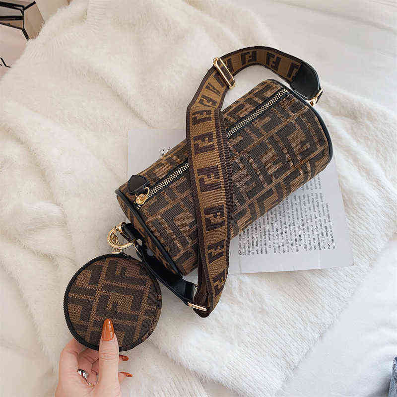 Handbag Canvas cylinder women's 2022 new printed Boston Bag sling Shoulder Messenger pillow, Brown
Handbag Canvas cylinder women's 2022 new printed Boston Bag sling Shoulder Messenger pillow, Brown