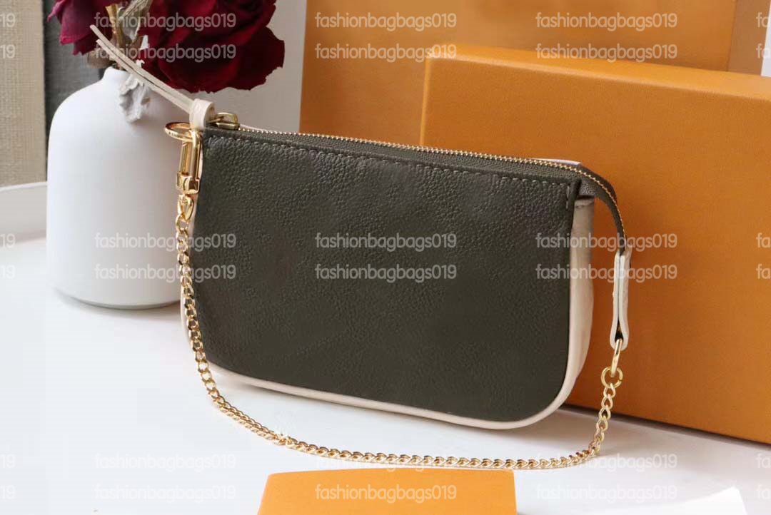 Mini Pochette bag Spring Escape embossed Monograms Empreinte leather two-in-one Multi-function Bags Zipped Pockets Shoulder Bags designers M81284
Mini Pochette bag Spring Escape embossed Monograms Empreinte leather two-in-one Multi-function Bags Zipped Pockets Shoulder Bags designers M81284