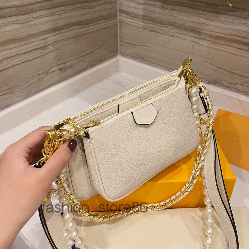 Shoulder bag chains A pearl chain Luxury Designer Bags Brand Fashion Axillary package Handbag, Picture color with purple logo 23x13cm
Shoulder bag chains A pearl chain Luxury Designer Bags Brand Fashion Axillary package Handbag, Picture color with purple logo 23x13cm