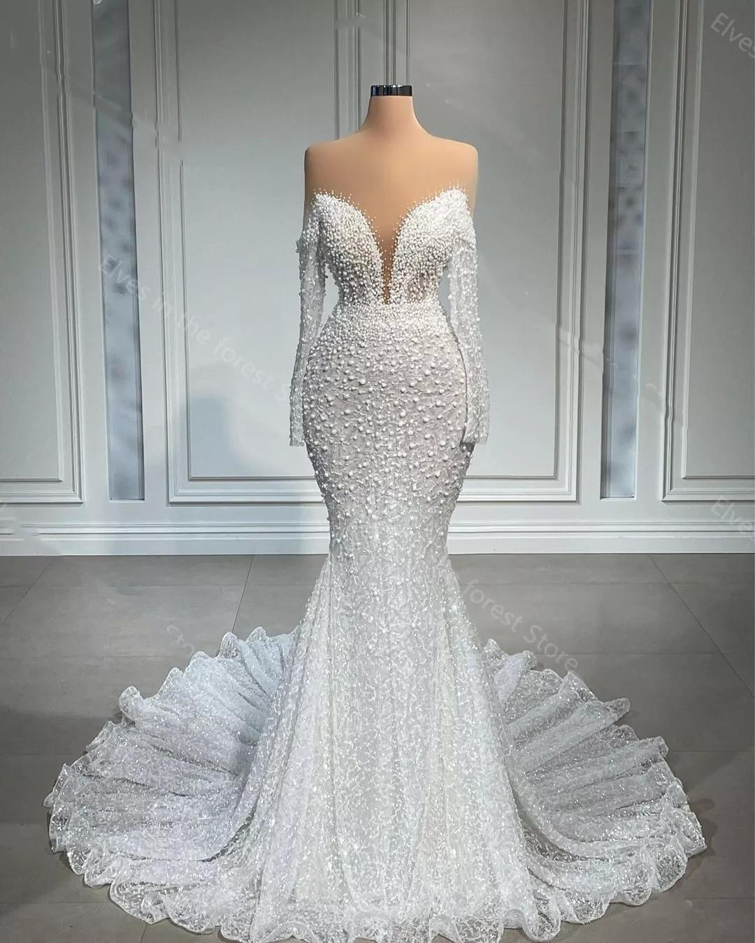 Heavy Pearls Illusion Mermaid Wedding Dresses For African Women 2022 Sheer Beads Bridal Gown With Long Train Vintage Long Sleeves Robe De Mariage