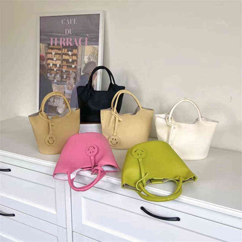 Heat leather smiling face bucket bag portable messenger version simple leisure women's Purses, White
Heat leather smiling face bucket bag portable messenger version simple leisure women's Purses, White
