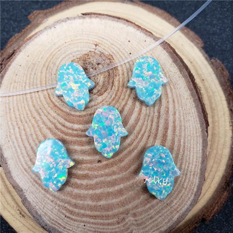 Chains 10pcs/lot Wholesale 11 13mm Fire Mint Opal Hamsa Shape Pendant With Synthetic Stone High Quality For Necklace GiftChains
Chains 10pcs/lot Wholesale 11 13mm Fire Mint Opal Hamsa Shape Pendant With Synthetic Stone High Quality For Necklace GiftChains